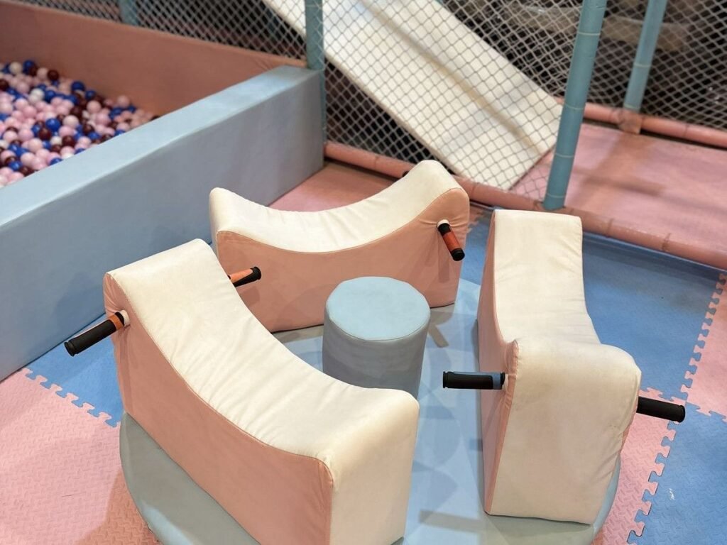 Seesaw rocker toys in the toddler play area at OWI Kids World